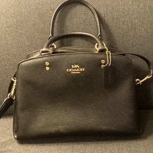 Brand New Authentic Coach handbag. Genuine black leather with gold trim